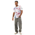 Men’s white cotton crew neck T-shirt by Leaky TS with all-over print design, front view showcasing the pattern and fit.