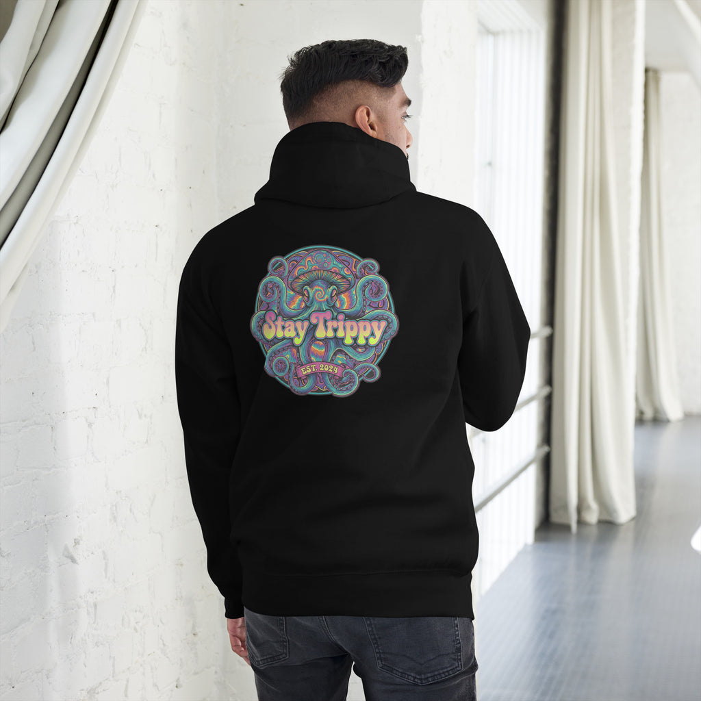 Leaky Ts Stay Trippy limited run unisex hoodie made of cotton heritage, black premium pullover hoodie with back design.