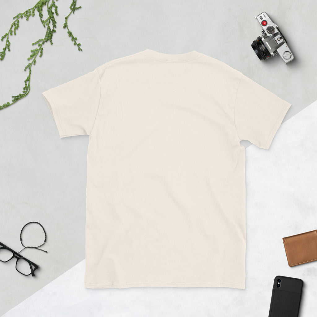 Unisex Leaky Ts basic soft-style T-shirt in natural color, shown from the back with a comfortable fit.