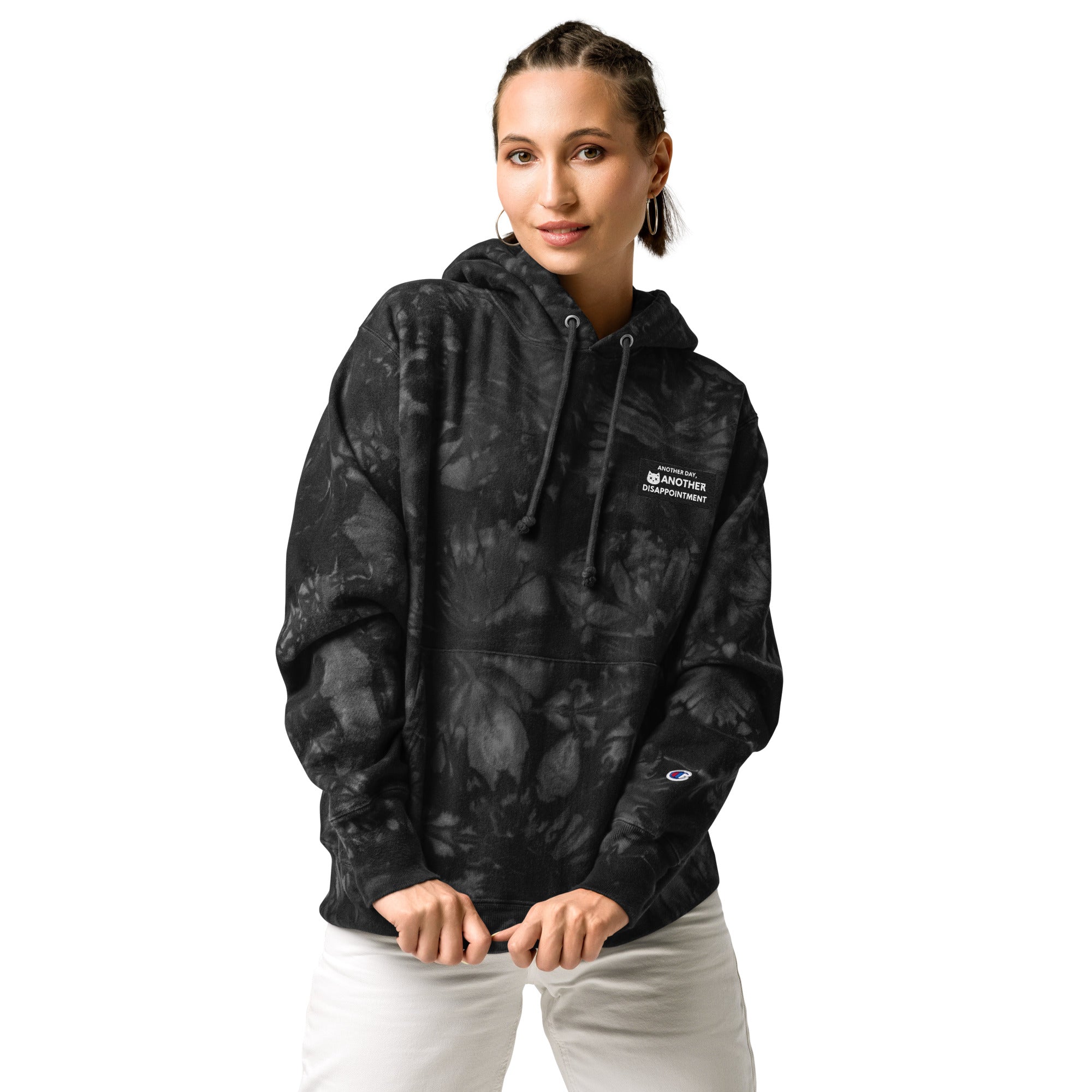 Black Champion Leak-Dye Hoodie by Leaky ts featuring a unisex tie-dye design and front view.