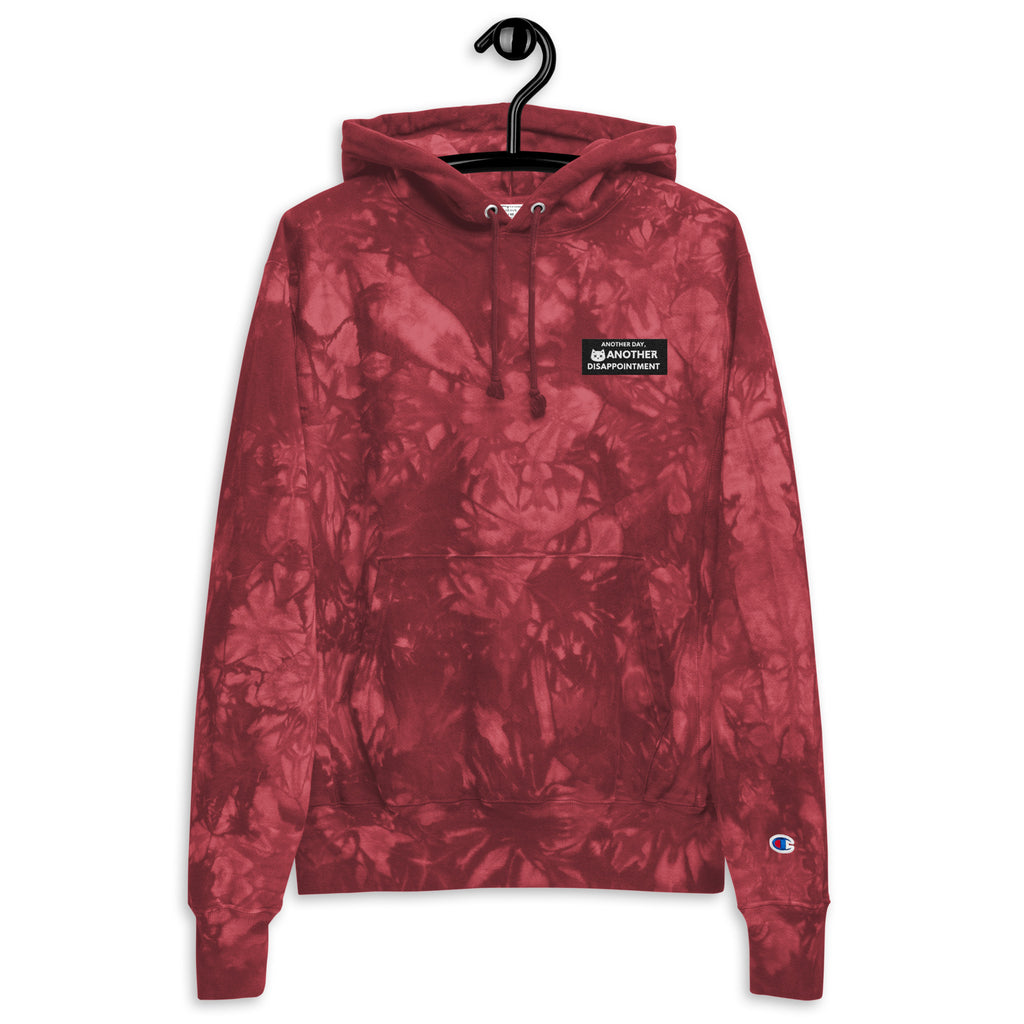 Leaky ts Champion Leak-Dye Hoodie in mulled berry, unisex tie-dye design with front view, showcasing vibrant colors and cozy fit.