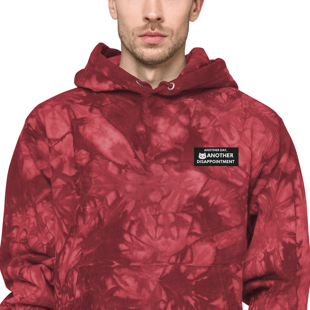 Leaky ts Champion Leak-Dye Hoodie in mulled berry, unisex fit with vibrant tie-dye pattern and cozy hooded design.