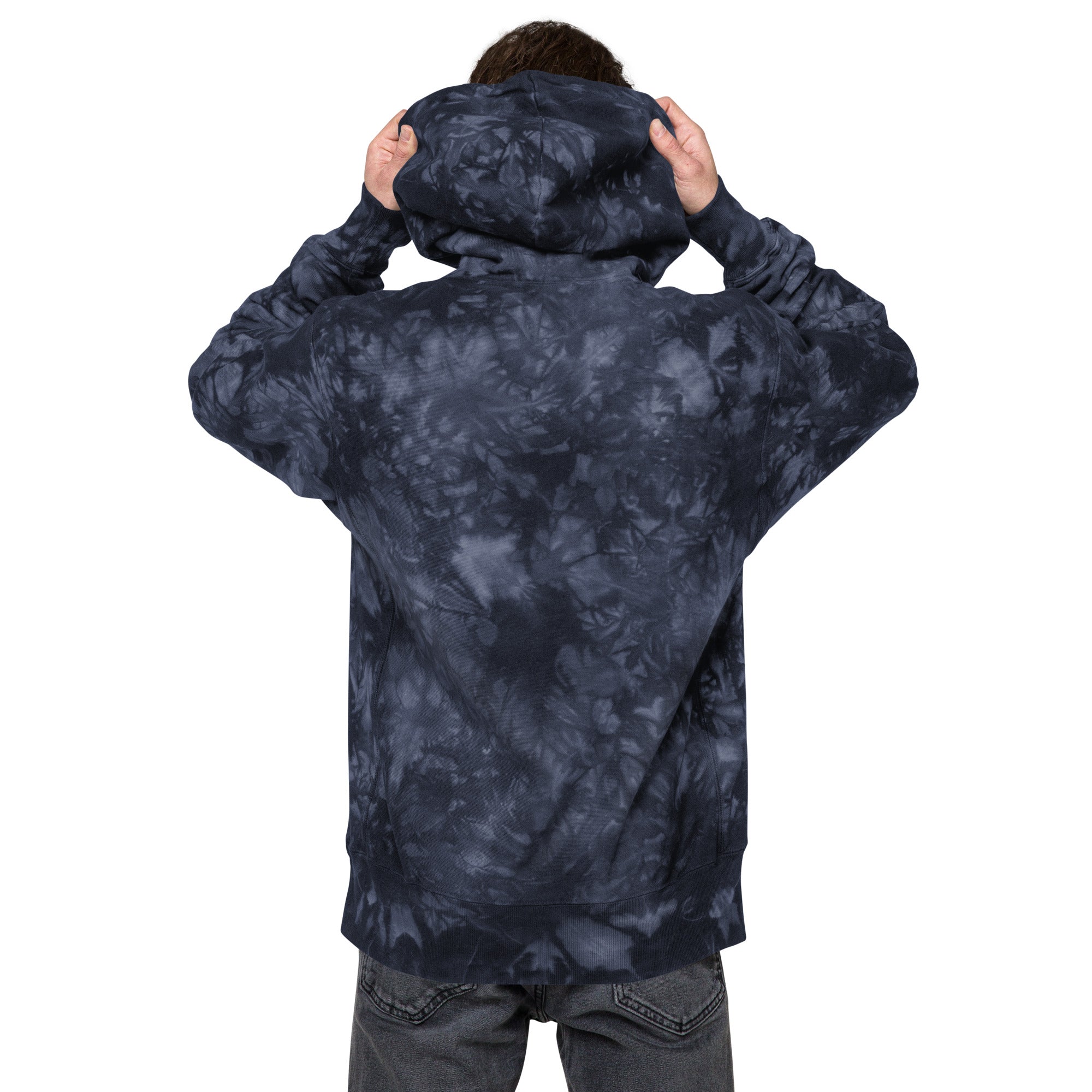 Unisex navy Champion Leak-Dye Hoodie by Leaky ts featuring a bold, unique leak-dye pattern on soft cotton fabric.
