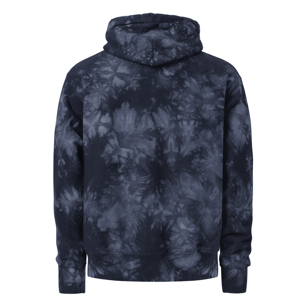 Unisex Champion Leak-Dye Hoodie by Leaky ts featuring navy tie-dye pattern and relaxed fit, back view.