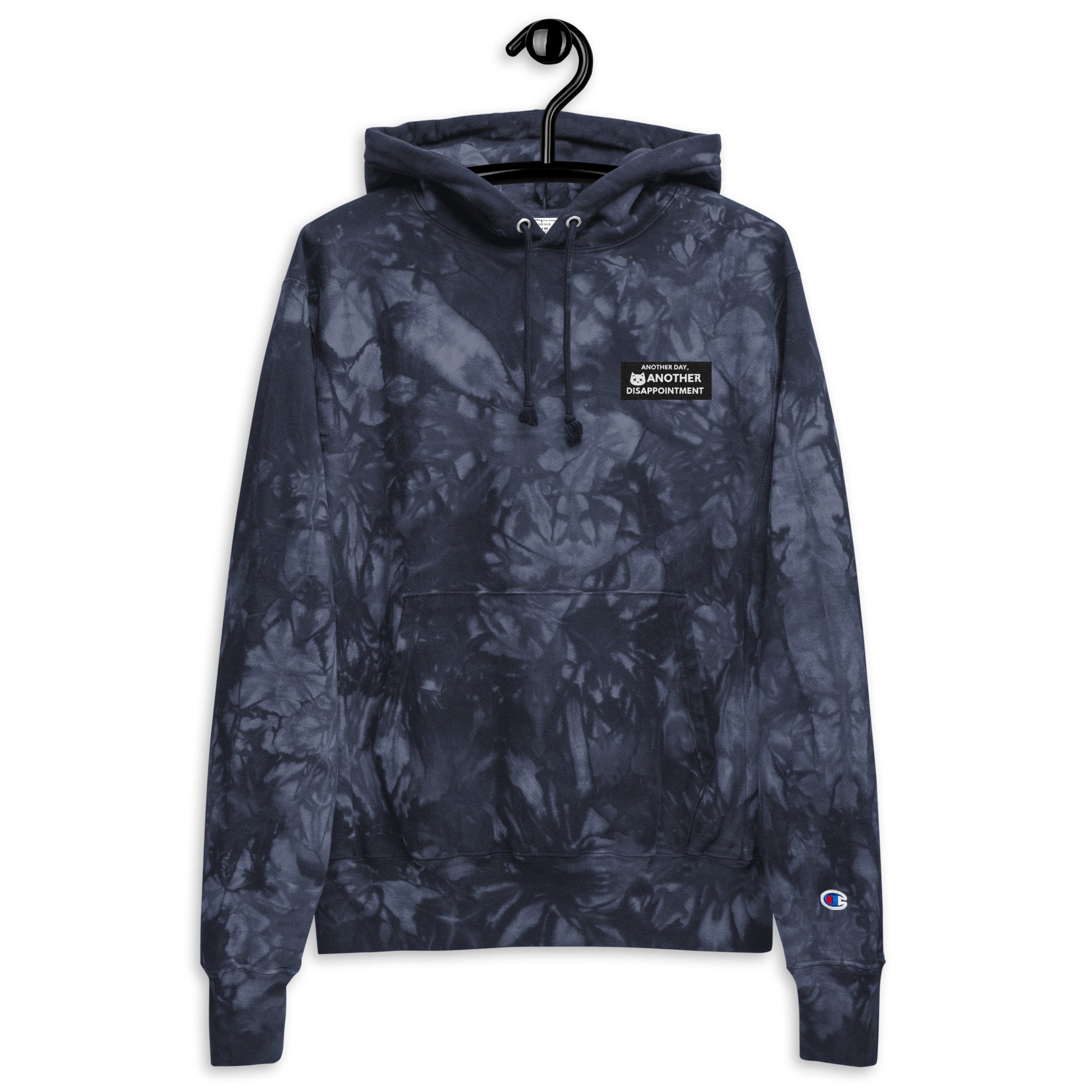 Unisex navy Champion leak-dye hoodie by Leaky ts with a front view, showcasing the unique leak-dye pattern and casual fit.