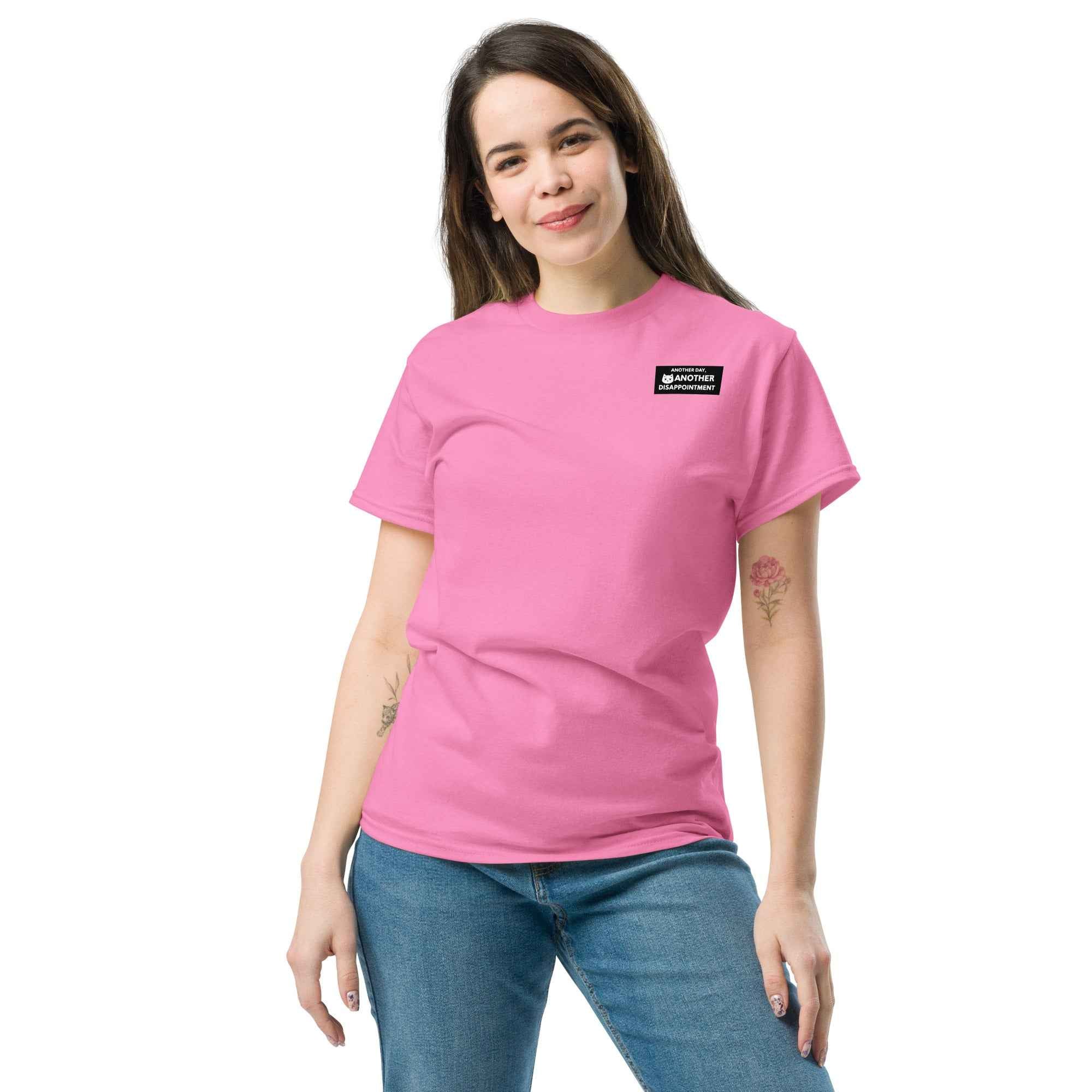 Unisex classic T-shirt in azalea color featuring the "Another day another disappointment" design by Leaky TS.