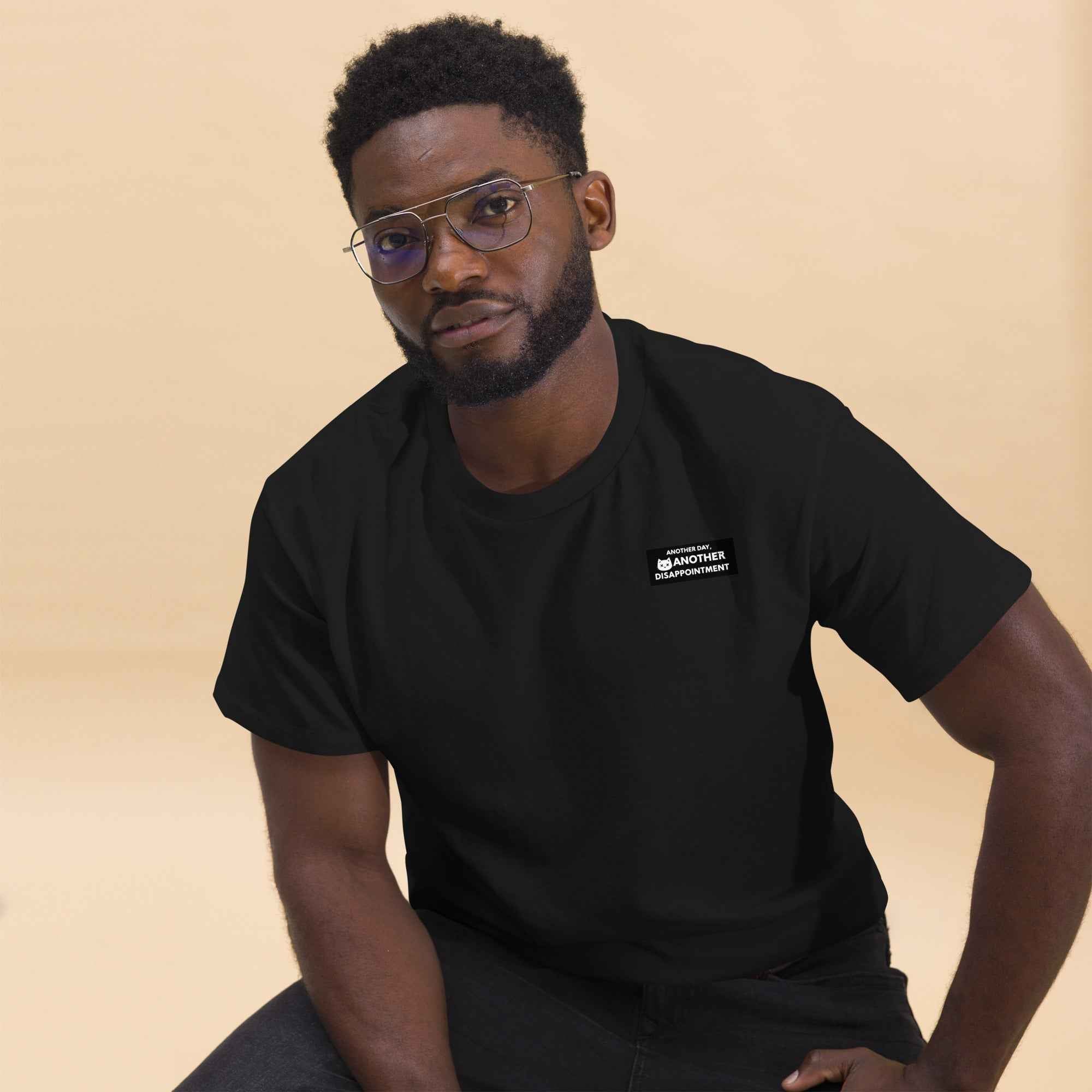 Black unisex classic tee by Leaky TS featuring a simple front design, casual fit, and comfortable fabric.