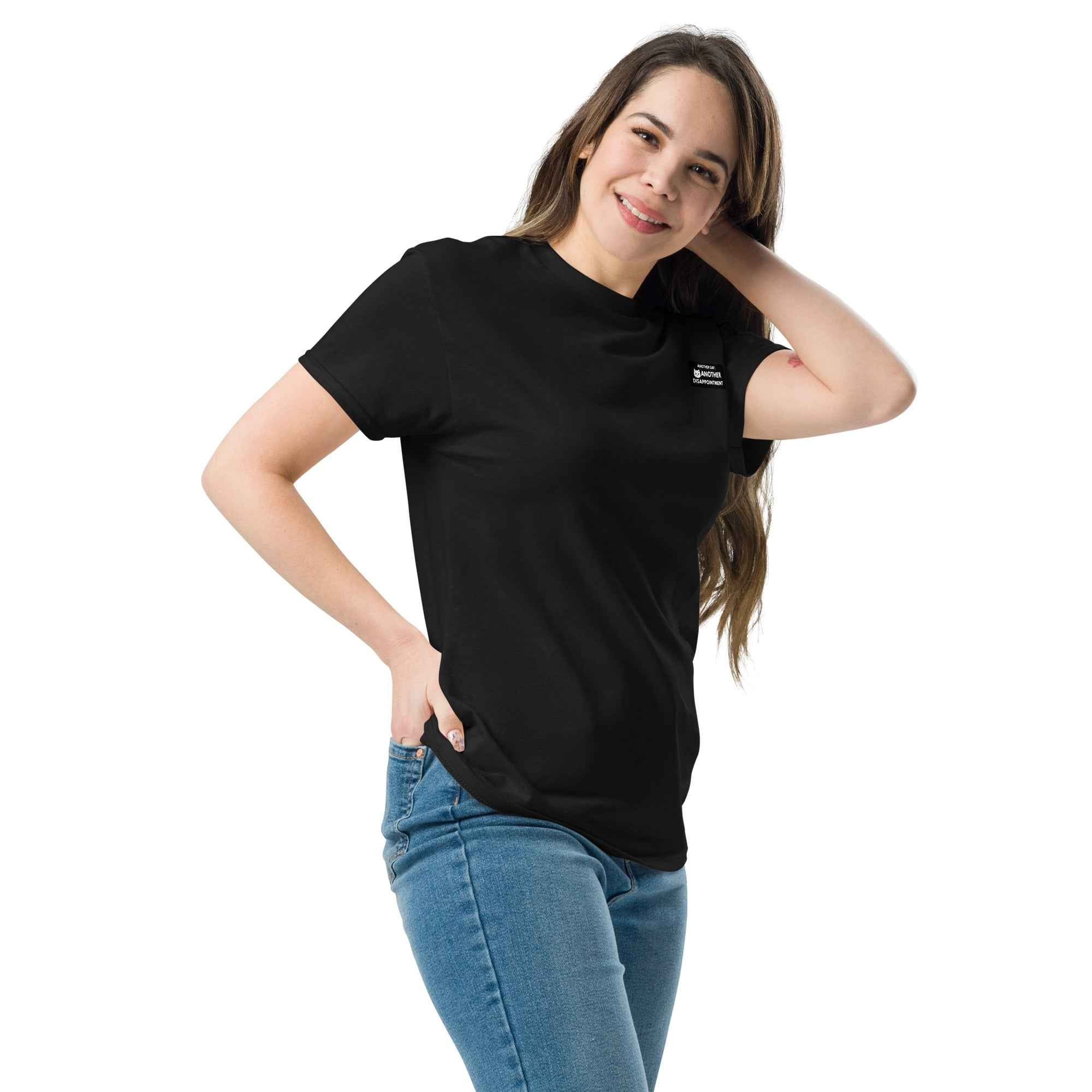 Black unisex classic T-shirt by Leaky TS featuring a simple, comfortable design with a front left view.