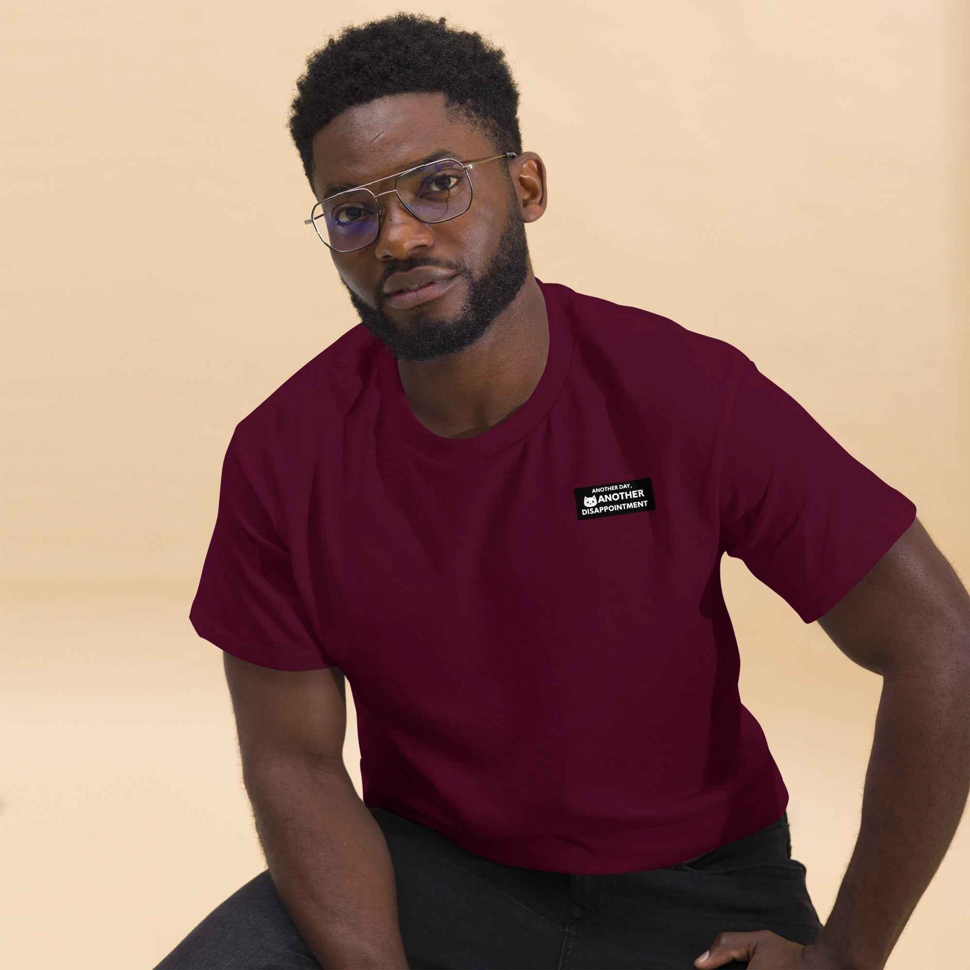 Maroon unisex classic T-shirt by Leaky TS, featuring a simple design, front view, casual fit, and soft fabric.