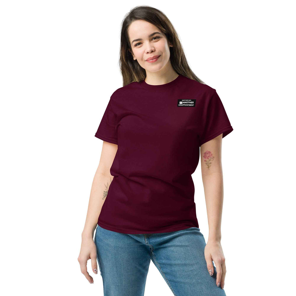 Maroon unisex classic tee by Leaky Ts featuring a simple, comfortable design shown from the front.
