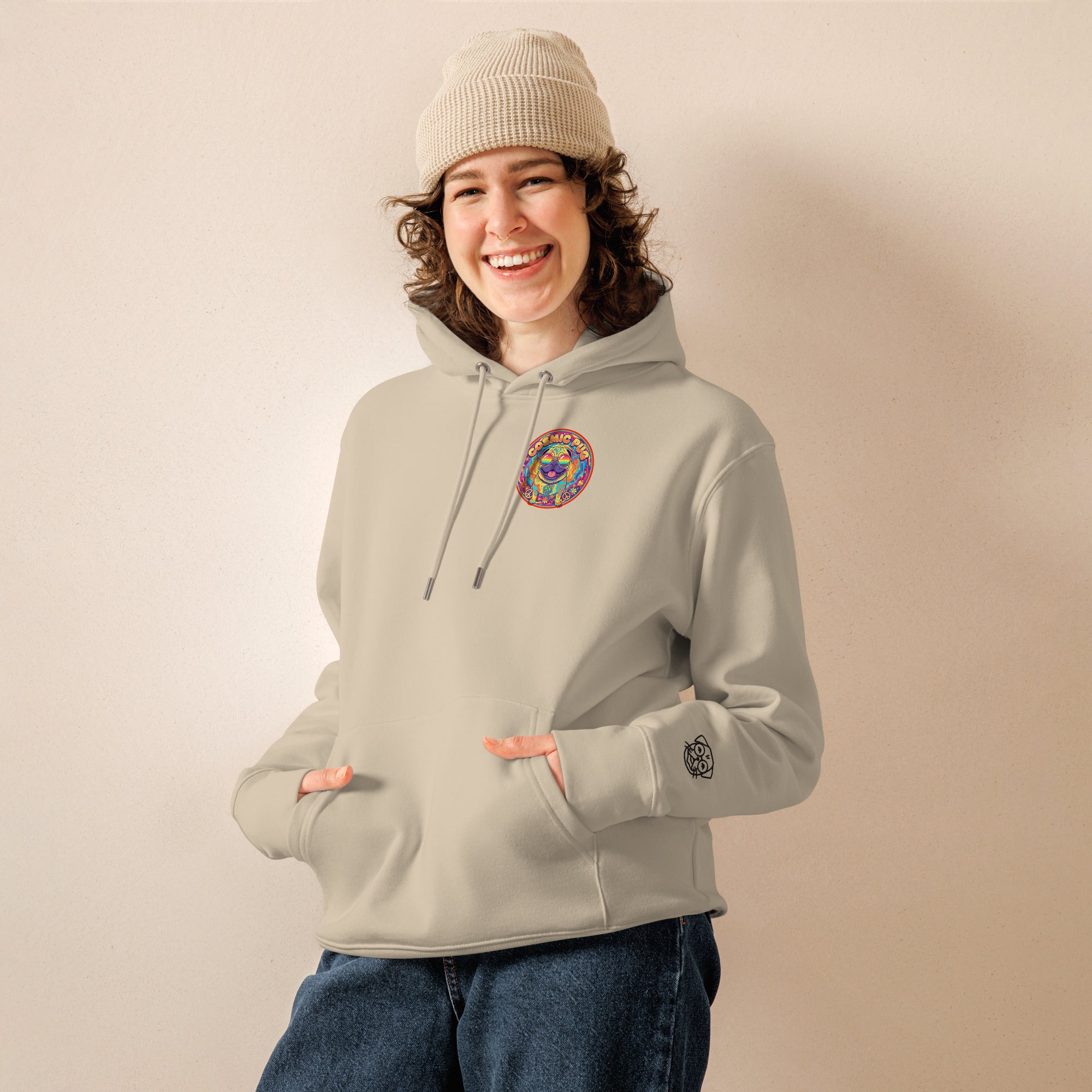 Unisex Cosmic Pug Hoodie by Leaky ts in desert dust color, made from 100% organic cotton, showing front view with pug graphic design.