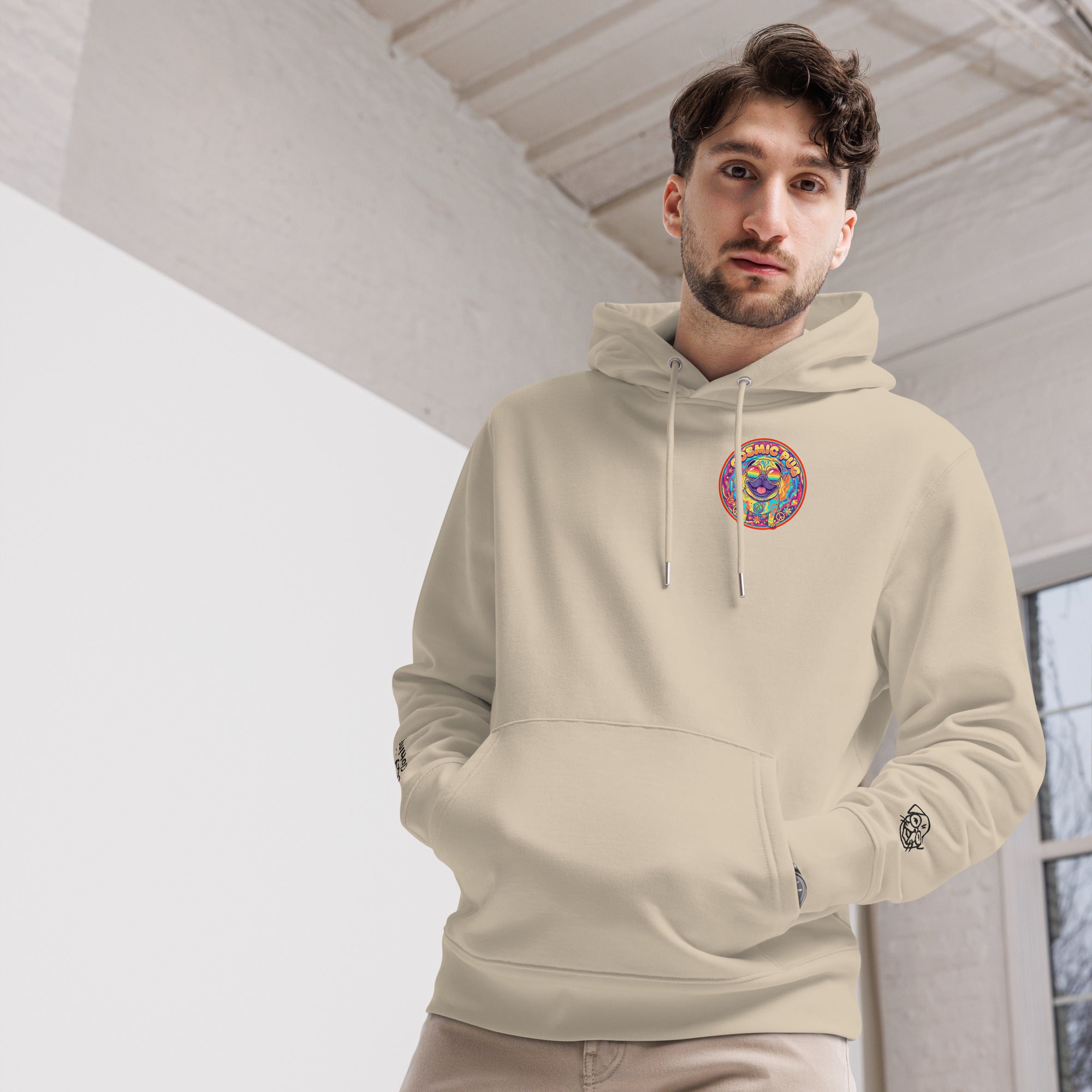 Leaky ts Cosmic Pug hoodie in desert dust, made from 100% organic cotton, front view showing pug graphic and unisex fit.