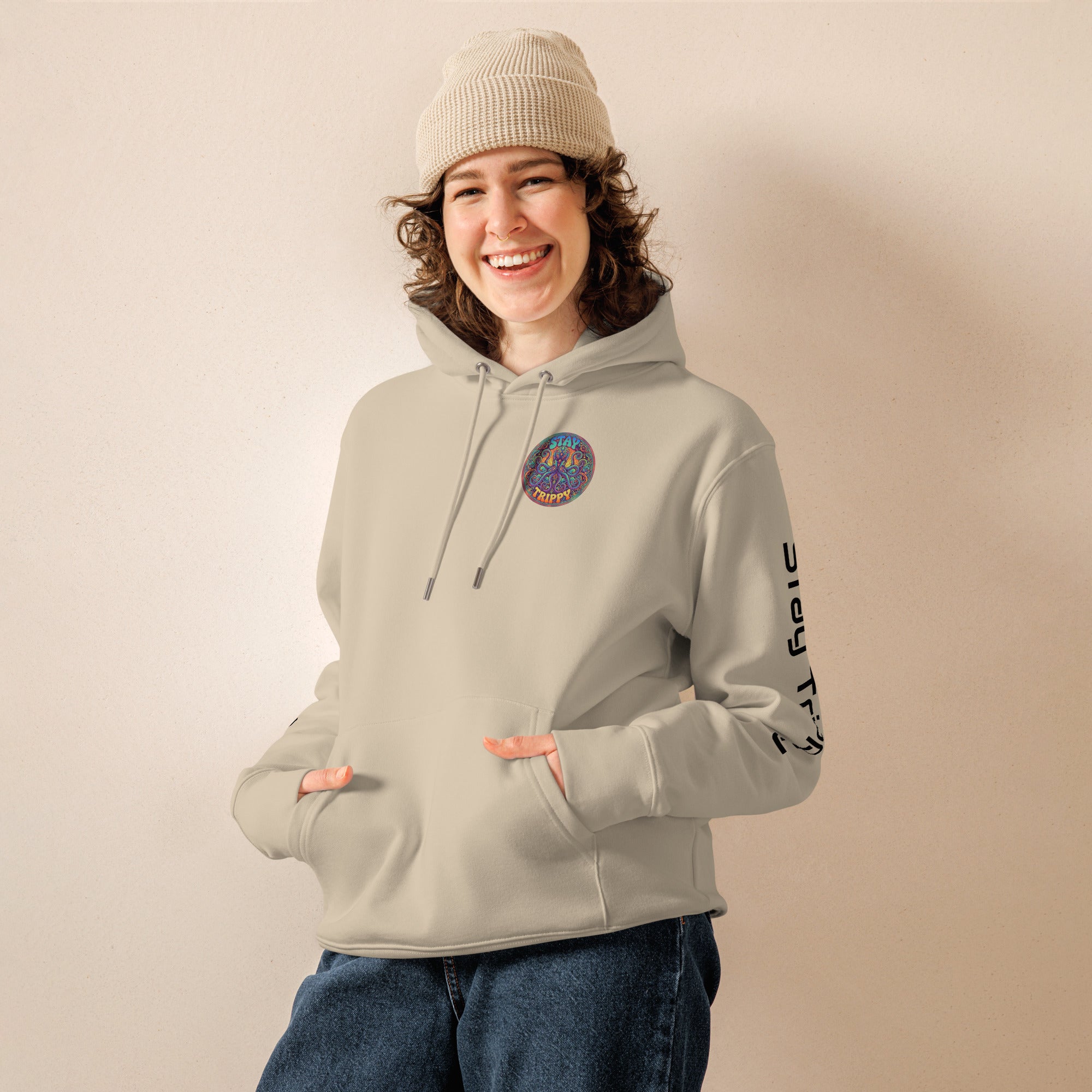 Leaky Ts Stay Trippy hoodie in desert dust, unisex eco organic cotton, front view showing relaxed fit and minimalist design