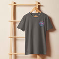 Unisex organic mid-light anthracite t-shirt with "Stay Trippy #2" graphic by Leaky Ts, front view showing soft fabric and relaxed fit.
